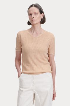 Pre-Fall 2024 Collection Relaxed Fit V-neck Pointelle Knit Top, Classic V-neck Knit Top For Summer, Elegant Textured Knit V-neck Top, Fitted V-neck Cashmere Top, Classic V-neck Spring Knit Top, Elegant V-neck Knit Top With Ribbed Neckline, Beige Ribbed V-neck Sweater For Spring, Elegant V-neck Summer Sweater, Spring Beige Cashmere Tops