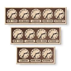 three wooden clocks with different time zones on them, one is brown and the other is white