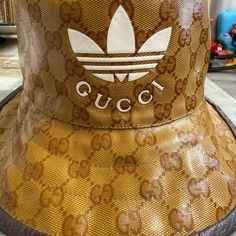 Selling This Unused Gucci X Adidas Bucket Hat Gucci Adjustable Bucket Hat, Gucci Brown Short Brim Hat, Designer Brown Hat With Short Brim, Gucci Adjustable Brimmed Hat, Elegant Gucci Adjustable Hat, Designer Brown Brimmed Hat, Gucci Luxury Brimmed Hat, Gucci Adjustable Flat Brim Hat, Luxury Gucci Brimmed Hat