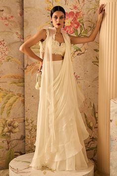 Gravitas ivory chiffon draped sari set Indian Drapes, Cut Work Blouse, Wedding Edit, Ridhi Mehra, Diwali Party, Organza Blouse, Ruffle Saree, Embroidered Crop Tops, Feminine Romantic