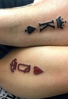 two people with matching tattoos on their legs