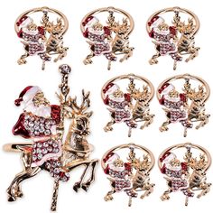 six christmas brooches with santa riding on a horse and holding a bell, all in gold tone