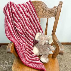 red striped crochet baby blanket draped on a small rocking chair with a stuff elephant sitting on the chair Ripple Baby Blanket Crochet Pattern, Moss Stitch Baby Blanket, Easy Crochet Baby Blanket Pattern, Crochet Moss Stitch, Crochet Ripple Baby Blanket, Crochet Moss, Baby Blanket Crochet Pattern Easy, Crochet Ripple Pattern, Crochet Valentine Patterns