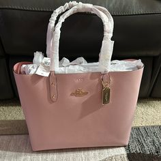 Color: Light Pink Leather Light Pink Bag, Pink Coach Purse, Pink Coach Purses, High End Handbags, Dream Items, Bday Wishlist, Trendy Purses, Color Light Pink, Tote Outfit