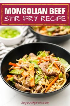 beef stir fry with noodles in a black bowl