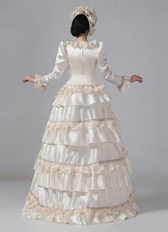 19th Century Champagne Victorian Bustle Gown Maid Dress Color:Champagne  Material: This dress made of High Quality Satin, soft,smooth and comfortable to wear  Sleeve Length:  Long Sleeve  Dresses Length:Floor Length  Neckline:  O-Neck  Decoration: Ruffles + Lace  Package Includes:  Dress + Hat   The length of skirt about 45 inches (114 cm) long from waist to hem regardless of size. This dress is pictured with a 6-hoop skirt Petticoat underneath to achieve the look. Petticoat are NOT INCLUDE Cream Satin Dress For Banquet, Beige Satin Dress For Banquet, Fitted Long Sleeve Gown With Ruffles, Fitted Long Sleeve Ball Gown With Ruffles, Fitted Champagne Ball Gown, Champagne Fitted Ball Gown, Fitted Beige Gown For Banquet, Fitted Beige Maxi Dress For Banquet, Fitted Beige Satin Maxi Dress