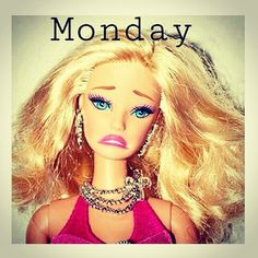 a barbie doll with blonde hair and blue eyes wearing a pink top that says monday