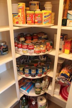 an organized pantry with lots of food in it