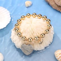 Embrace the natural beauty of summer with our unique Natural Stone Heart Bracelet with Pearl. This vintage-inspired charm will elevate your fashion and style, adding a special touch to any outfit. The 18k Gold on Brass also ensures the long-lasting color retention. The natural stones and glimmering pearl guarantee a shinning look that will make you stand out on any occasion. Don't miss out on this popular and timeless accessory! DETAILS Plating: 18k Gold Materials: 18k Gold on Brass, Natural Sto Trendy Gold Beaded Heart Bracelet, Trendy Gold Bracelets With Natural Stones, Summer Heart-shaped Gold Jewelry, Beach-valentine's Day Heart Beads Jewelry, Bohemian Gold Heart Bracelet For Gift, Bohemian Gold Heart Bracelet As Gift, Casual Gold Beaded Charm Bracelet, Casual Gold Beads Jewelry Gift, Casual Gold Beaded Jewelry As Gift