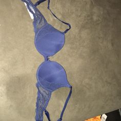 Brand New Never Worn Size 32c Bra That’s Navy Blue And Lace On The Sides, Has A Bow In The Middle And Is Adjustable ! Blue Stretch Bra With Removable Pads, Blue Push-up Bra With Removable Pads, Blue Push-up Bra With Lined Body, Fitted Blue Bra With Lined Body, Blue Fitted Bra With Removable Pads, Fitted Blue Bra With Removable Pads, Blue Fitted Push-up Bra, Fitted Blue Push-up Bra, Blue Bra