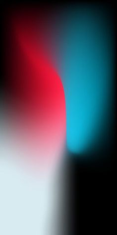 a blurry background with red and blue colors