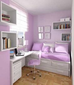 a bedroom with purple walls, white furniture and bookshelves on the shelves is shown