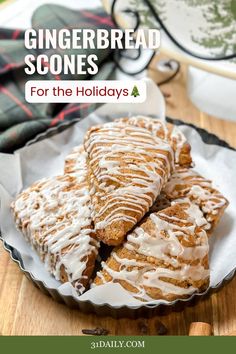 gingerbread scones with white icing on a plate