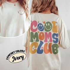 Join the Cool Moms Club with this stylish Comfort Colors shirt that is perfect for all the overstimulated moms out there! This Mama shirt is not only funny but also ultra-comfortable thanks to the soft cotton trendy fabric. Whether you're looking for a Mother's Day gift, a mom birthday gift, or just a treat for yourself, this trendy mom shirt is a must-have. Embrace the mom life in a cool and fashionable way with the Cool Moms Club Comfort Colors tee. 💥I. ABOUT PRODUCT - There are many ways to express your personality and wearing our products with eye-catching patterns and meaningful words is one of the ways. Comfortable, casual, and loose-fitting, our products will surely become one of your favorites. Made of cotton, safe and comfort on anyone. - Using a unique water-based dyeing process Casual Multicolor Shirt For Mother's Day, Retro White Tops For Mother's Day, Retro Cotton Tops For Mother's Day, Multicolor Cotton Slogan Shirt, Multicolor Casual Tops For Mother's Day, Casual Multicolor Tops For Mother's Day, Multicolor Cotton Shirt With Slogan, Fun Multicolor Tops For Mother's Day, Trendy Graphic Print Shirt For Mother's Day