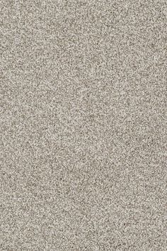 a beige carpet textured with small speckles