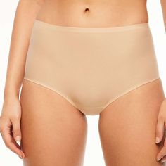 The Chantelle Soft Stretch Brief panty is a wardrobe must-have. Stay comfortable all day in this seamless brief. Eliminates visible panty lines with a smooth laser-cut edge. The seamless full brief from the pioneering one-size underwear program truly fits. This innovative style has a luxe, high-performance fabric that is engineered to last, retain its stretch and adapt to all body types. 360 Degree Adaptable Stretch with moisture wicking, lightweight and breathable. Fits XS-XL for full coverage or up to 2X for lower coverage. Loved by editors and customers alike, the award-winning underwear is an easy fit for any season. Style# C2647 Style: Soft Stretch Seamless Full Brief Fabric: Body: 80% Polyamide, 20% Elastane. Gusset: 100% Cotton. Design: Seamless high-waisted full brief. Luxe stretch Beige No-show Shapewear With Soft Touch, Beige No-show Soft Touch Shapewear, Beige Soft Touch Intimate Briefs, Beige Shapewear Briefs, Elegant Seamless Second-skin Bottoms, Supportive Beige Shapewear Briefs, Innovative Fashion, Performance Fabric, Bra Sizes