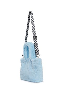 This set includes a fuzzy faux fur tote bag with an embroidered design of Julius’ face on the front, a top snap button closure, top handles, an all-over print lining of Julius’ face, a removable keychain featuring a vegan leather heart printed with Julius’ friend Skurvy, an enamel charm of Julius’ face and an enamel star, a removable and adjustable nylon shoulder strap with a checkered pattern, and a detachable nylon wallet with a graphic front print of ‘I Heart Julius,’ a velcro closure, matchi Trendy Shoulder Bag With Faux Fur Lining, Blue Rectangular Bags For Winter, Blue Rectangular Winter Bags, Casual Blue Shoulder Bag For Winter, Trendy Blue Shoulder Bag For Winter, Trendy Blue Bags For Winter, Trendy Blue Winter Bags, Trendy Faux Fur Bag For Everyday Use, Trendy Faux Fur Rectangular Shoulder Bag