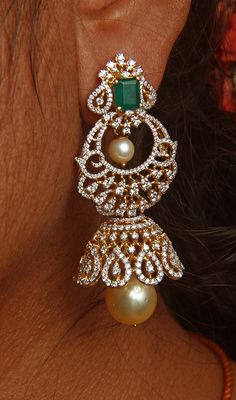 18 karat gold '2 in 1' detachable diamond jhumkas - diamond dangle earrings with color stones & pearls
  this product has inter changeable stones in the earrings
  width of the jhumka : 0.90 inches
  

introducing our exquisite 18 karat gold '2 in 1' detachable diamond jhumkas, a true masterpiece of indian craftsmanship. these stunning diamond dangle earrings are designed to make a statement and elevate your style to new heights.
  
  with their interchangeable stones, these earrin Bollywood Diamond Gold Jhumkas, Bollywood Gold Diamond Jhumkas, Bollywood Style Diamond Gold Jhumkas, Bollywood Style Gold Diamond Jhumkas, Gold Diamond Temple Jewelry Jhumkas, Gold Diamond Jhumkas In Temple Jewelry Style, Diamond Gold Jhumkas For Reception, Gold Diamond Jhumkas For Festivals, Gold Diamond Jhumkas For Reception