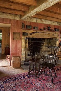 a living room filled with furniture and a fire place