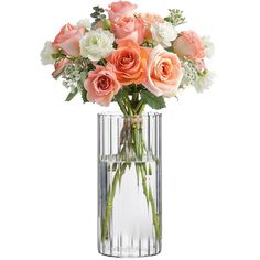 a vase filled with lots of pink and white flowers