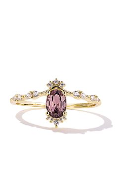 Finding unique jewelry that surpasses the outdated, seen-everywhere styles is a challenge. The Designer ring offers you a much-needed reprieve, featuring an elegant plum crystal and a crystal-studded gold band for a regal appearance that is sure to pull you out of your styling slump. Plus, its warm hue provides endless Elegant Jeweled Open Ring, Elegant Gold Crystal Ring With Gemstone Accents, Elegant Jeweled Crystal Ring For Formal Occasions, Elegant Formal Jeweled Crystal Ring, Elegant Jeweled Crystal Ring For Wedding, Gold Crystal Ring With Gemstone Accents For Formal Occasions, Elegant Jeweled Oval Rings, Elegant Oval Jeweled Rings, Cute Promise Rings