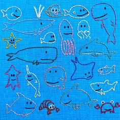 a blue cloth with various sea animals drawn on it