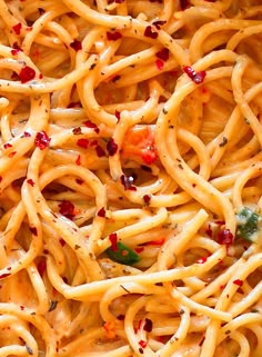 a close up view of some noodles with sauce