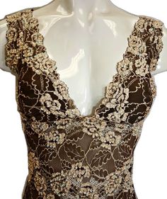 Elegant Beige Embellished Tops, Elegant Embellished Beige Tops, Brown Fitted Top For Evening, Elegant Beige Sequined Tops, Brown Sleeveless Evening Tops, Elegant Lace Top With Sequins, Elegant Lace Tops With Sequins, Beige Lace Top For Party, Elegant Brown Tops For Evening