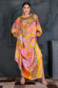 Appealing Tapestry Print Maxi long Kaftan with exquisite embellishments of beads Luxury resort wear kaftan Look graceful with this appealing Abstract print kaftan with this unique orange, Yellow print you get a capturing stylish appearance as it fits every kind of body line with exquisiteness. The ornamental beaded neckline is an attractive addition to this kaftan. Wearing it on any occasion, you look graceful and tempting all the way. ONE SIZE FIT ALL KAFTAN ( Small to 8XL) - hand-applied: crys Plus Size Cruise Outfits, Satin Kaftan, Maxi Dress Silk, Silk Kaftan Dress, Silk Caftan, Kaftan Tunic, Luxury Resort Wear, Kaftan Maxi Dress, Geometric Inspiration