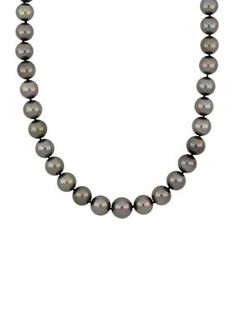 Belk & Co. 10-12.5 Millimeter Cultured Tahitian Pearl Strand Necklace With 14K White Gold. This pearl strand features lustrous Tahitian cultured pearls set together in a classic graduated design with a 14-karat white gold diamond ball clasp. This alluring pearl necklace makes a perfect elegant addition to any jewelry collection. Diamond Ball, Pearl Strands Necklace, Pearl Strand, Pearl And Diamond Earrings, Bow Necklace, Pearl Set, Pearl Strands, Tahitian Pearls, Fine Jewellery Necklace