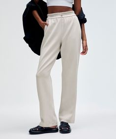 Feel It To Believe It. These Pants Have A Peach-Fuzz Touch That Is Impossible To Resist. Dress Them Up Or Down, And Enjoy The Softness All Day. Designed For Casual. An Easy Fit That Floats Away From Your Body:falls Straight Down From Hip To Hem:31" Inseam, Intended To Sit Below The Ankle For Heights Of 55"-58". Front Pockets With Interior Card Sleeve. Shockcord At The Waist To Customize Fit. | Softstreme High-Rise Pant Regular Lululemon Full-length Bottoms With Elastic Waistband, Lululemon Relaxed Fit Full Length Pants, Casual Full Length Lululemon Pants, Casual Full-length Lululemon Pants, Lululemon Casual Full-length Pants, Lululemon Relaxed Fit Full Length Bottoms, Lululemon Wide Leg Pants With Elastic Waistband, Lululemon Wide-leg Pants With Elastic Waistband, Lululemon Stretch Pants For Loungewear