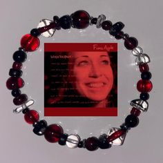 Handmade 90s grunge stretchy bracelet. Each bracelet is unique and this one was inspired by Fiona Apple's 1999 album, When The Pawn...  (but it can also just be a red and black bracelet.) Very stretchy with mostly glass beads and some metal beads. I don't have exact measurements as the bracelet stretches and it depends on how you wear it but if you have anywhere near an average wrist size (which is pretty consistent) it will definitely fit and could probably fit bigger people too. Also if it fit 90s Grunge, Black Bracelets, Stretchy Bracelets, Metal Beads, Diy Bracelets, Arm Band, Glass Beads, Jewelry Bracelets, Bracelet