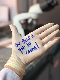 a hand with writing on it that says the best is yet to come