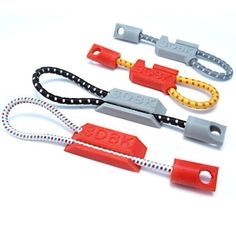 three different types of lanyards on a white background, one is red and the other is grey