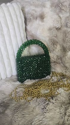 100% Handmade beaded bag for special occasion  Luxury shiny beads Exclusive design The purse is handmade with care and attention to detail, ensuring that each one is unique. Size: 7.5in*9in*3in. Color is dark green You can carry all necessary essentials and look very elegant. There is magnetic snap closure for easy access You will receive a dust bag and stylish gift box.  I believe you will collect the gorgeous memories with this luxury bag. Feel free to contact me for any question or special cu Beaded Shoulder Bag Clutch, Green Beaded Bag For Party, Green Beaded Bags For Parties, Beaded Clutch Shoulder Bag As Gift, Beaded Clutch Shoulder Bag For Gifts, Green Beaded Rectangular Evening Bag, Luxury Green Beaded Bags, Trendy Handheld Beaded Evening Bag, Beaded Crossbody Evening Bag For Party