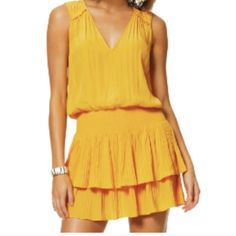 Dance The Night Away In This Ramy Brook Vibrant Yellow Sleeveless Mini Dress. This Number Is Styled With Motion In Mind: The Crepe De Chine Fabric Celebrates Your Body In All The Right Ways And The Flounced Skirt Falls Above The Thigh: Perfect For A Mid-Song Spin. With Its Smocked Waist And Wide-Halter Neck The Dress Looks Fabulous On Everyone. Size Medium New With Tags. Originally $375.00 It Can Be Worn As Vneck Like You See In The First Photo Or Buttoned Up In The Front Like Shown In The Secon Flowy Sleeveless Ruched Mini Dress, Flowy Sleeveless Mini Dress With Ruched Detail, Metal Mesh Dress, Hunter Dress, Flounced Skirt, Blush Tie, Blue Satin Dress, Yellow Mini Dress, One Shoulder Cocktail Dress