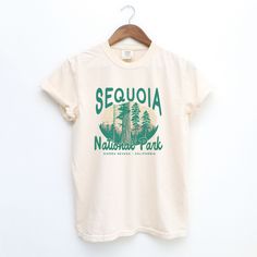 Step into the wild with our Yam-colored Sequoia National Park Comfort Colors T-shirt. This vibrant tee captures the rich, earthy tones of Sequoia National Park’s famed landscapes, mirroring the deep hues of the park’s majestic sequoia trees at sunset. Made from 100% ring-spun cotton, this garment-dyed shirt is as durable as it is comfortable, designed to withstand the rigors of outdoor adventures while maintaining a soft feel. The warm yam color evokes the adventurous spirit and awe-inspiring be Spring Outdoor Crew Neck T-shirt, Letter Print T-shirt For Outdoor In Spring, Letter Print T-shirt For Outdoor Spring Activities, Spring Graphic Print Tops For Outdoor, Outdoor Graphic Tee For Spring, Outdoor Spring Graphic Tee Tops, Spring Outdoor Graphic Tee, Spring Graphic Tee For Outdoor, Summer Graphic Print Tops For Outdoor Activities