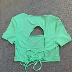 Open Back Crop Tee Size: M Brand: N/A Color: Light Green Condition: Nwot Brand New Never Worn Occasion/Style: Party, Going Out, Modern, Summer, Vacation, Pastel Fit: Fitted, Ribbed, Open Back With Tie Closure, Square Neckline Material: 100% Polyester Measurements (Flat): Pit To Pit: 14.5 Inches Shoulder To Shoulder: 8 Inches Waist: 12.5 Inches Neckline Plunge: 6.5 Inches Full Length: 13.5 Inches Spring Party Crop Top T-shirt, Spring Party Crop Top With Crew Neck, Green Crew Neck Crop Top For Summer, Green Crew Neck Crop Top For Spring, Spring Green Crew Neck Crop Top, Green Summer Party Tops, Summer Party Tops With Crew Neck, Party Cotton Top With Short Sleeves, Cotton Short Sleeve Party Tops