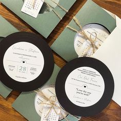 the wedding stationery is laid out on top of each other