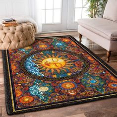 a rug with the sun and moon on it in front of a couch next to a window