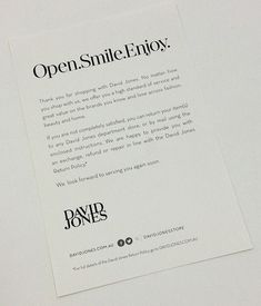 an open smile enjoy brochure is displayed on a white surface with the words open smile enjoy