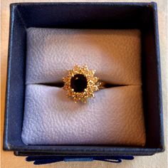 This Stunning 14k Yellow Gold Ring Frames Blue Sapphire Stone With 2 Rows Of Sparkling Diamonds In A Classic “Ballerina” Setting. 12 Smaller Diamonds Encircle The Top Row, Followed By 12 Slightly Larger Stones Encircling Bottom Row. 2 More Diamonds Are Set On Top Right And Left Side Of Band, As Shown In Photo #11, For A Total Of 28 Diamonds. Total Weight Of Diamonds Is Approximately 1k. Total Weight Of Single Sapphire Stone Is Approximately 1k. Total Weight Of Ring Is 6.04 G. Ring Is Size 7. Rin Hallmarked Sapphire Diamond Ring For Formal Occasions, Oval Yellow Gold Rings For Evening, Elegant Evening Rings With Halo Setting, Elegant Cluster Jewelry With Center Stone, Formal Sapphire Jewelry With Center Stone, Fine Jewelry Cluster For Formal Occasions, Elegant 14k Stamped Cluster Diamond Ring, Sapphire Ring For Formal Occasions, Formal Sapphire Diamond Ring Hallmarked