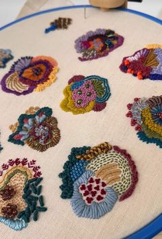 a close up of a embroidery on a table