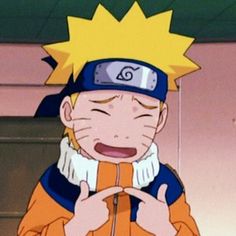 naruto with his eyes closed and one hand up to the side, wearing an orange jacket