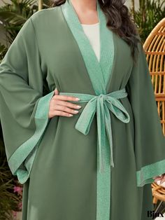 Bjux - Introducing our latest addition to the womens plus size fashion line: A Casual and Fashionable Abaya Robe. Featuring a Contrast Trim and Long Sleeves, this Open Front Loose Belted Kaftan Robe is a must-have for the fashion-forward woman looking for comfortable yet stylish attire. Long Abaya For Eid, Green Abaya For Eid, Womens Plus Size Fashion, Woman Looking, Fashion Line, Contrast Trim, Front Open, Plus Size Fashion, Must Haves