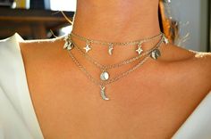 Chain is adjustable. Silver Dainty Necklace For Festivals, Silver Minimalist Choker For Festivals, Silver Adjustable Choker Jewelry, Minimalist Silver Choker For Festivals, Trendy Silver Moon Jewelry, Trendy Silver Jewelry With Moon Charm, Festival Star-shaped Silver Jewelry, Adjustable Silver Celestial Charm Necklaces, Silver Choker With Moon Charm As A Gift