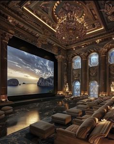 an ornately decorated home theater with chandelier and couches, overlooking the ocean