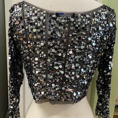 Havenbleu Sparkly Black Net With All-Over Silver Sequins And Beads , Scoop Neckline, 3/4” Sleeves , Lightweight Pullover Short 14” Length, Crop Top. New With Tag And Comes With Additional Sequins. Size S But More Like A M. Let The Party Begin Silver Embellished Party Top, Silver Long Sleeve Sequin Tops, Silver Long Sleeve Tops With Sequins, Silver Sequined Tops For Night Out, Silver Sequin Tops For Evening, Silver Sequined Tops For Festive Occasions, Silver Embellished Top For Party Season, Embellished Silver Top For Party Season, Embellished Silver Tops For Party Season