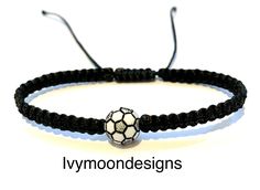 Handmade soccer ball bracelet-Handmade jewellery  Unisex, adjustable, waterproof     -waxed cotton thread-1.2mm     -acrylic soccer ball-10mm LENGTH : all bracelets are fully adjustable. They are made to measure approximately 16/17cm when closed and the threads with the adjustment knot allows them to open up to approximately 34/35cm. Kindly note as each item is individually handcrafted measurements are approximate. The bracelet is easily adjusted to fit any size wrist using the sliding knot . Th Adjustable Black Wristband For Sports Events, Adjustable Black Jewelry For Sports, Lovers Bracelet, Football Ball, Ball Bracelet, Football Lovers, Black Bracelets, Sliding Knot, Unisex Jewelry