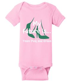 Future Team Pink & Green onesie. The onesie is on a pink garment with My Future is Team Pink & Green words and heels incorporated within the graphic. 5-ounce, 100% combed ring-spun cotton 1x1 baby rib Side-seamed Flatlock seams Double-needle ribbed binding on neck, shoulders, sleeves, and leg openings Innovative three-snap closure Pink Letter Print Onesie For Gender Reveal, Pink Cotton Onesie With Graphic Print, Pink Short Sleeve Onesie For Gender Reveal, Fitted Pink Onesie With Letter Print, Pink Cotton Onesie With Letter Print, Pink Cotton Bodysuit With Letter Print, Pink Short Sleeve Bodysuit With Letter Print, Pink Fitted Cotton Onesie, Fitted Pink Cotton Onesie